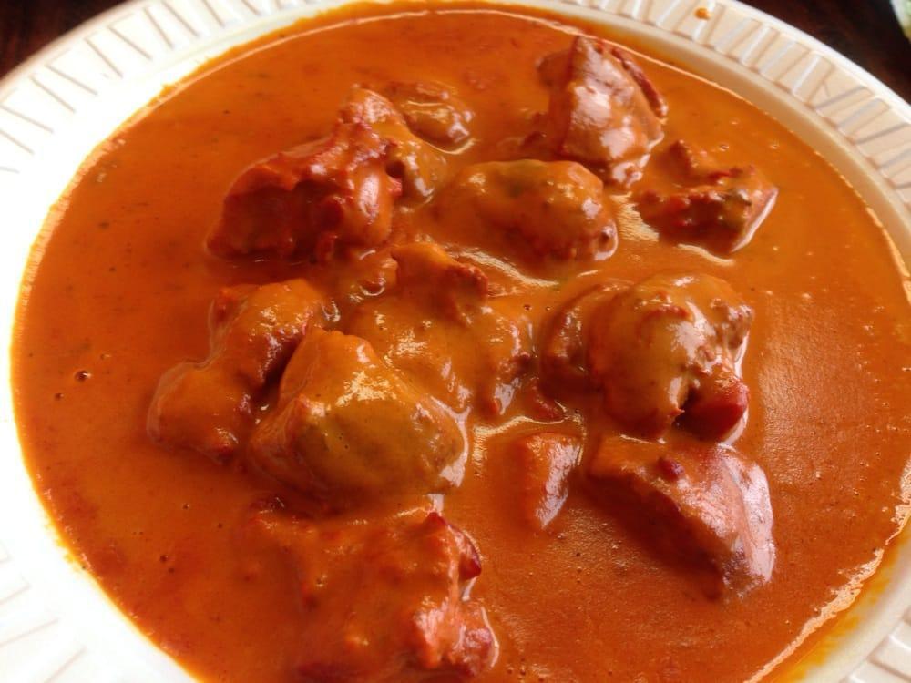 Chicken Tikka Masala · Broiled tandoori chicken tikka in mild creamy tomato sauce.
