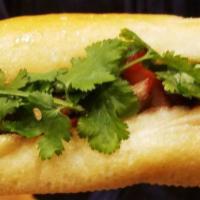 BBQ Pork Banh Mi · Chinese BBQ pork, house mayo, pickled carrots, cucumber, jalapeno, pepper, and cilantro.