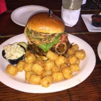 Jack Daniels Bourbon Burger · Our grilled burger smothered in Bourbon sauce and topped with French fried onions, bacon and...