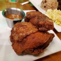 Mama Joyce's Fried Chicken · Bone-in chicken, marinated and seasoned in our special island spices and fried crispy to loc...