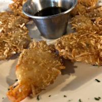 Coconut Shrimp · Jumbo shrimp coated in a delicious batter, fried flaky and golden and served with our specia...