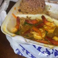 Curry Shrimp · Jumbo shrimp marinated in our authentic Jamaican spices the cooked in our signature curry sa...