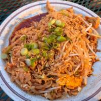 Pad Thai · Stir fried rice noodles with tamarind sauce, egg, bean sprouts, topped with ground peanuts a...