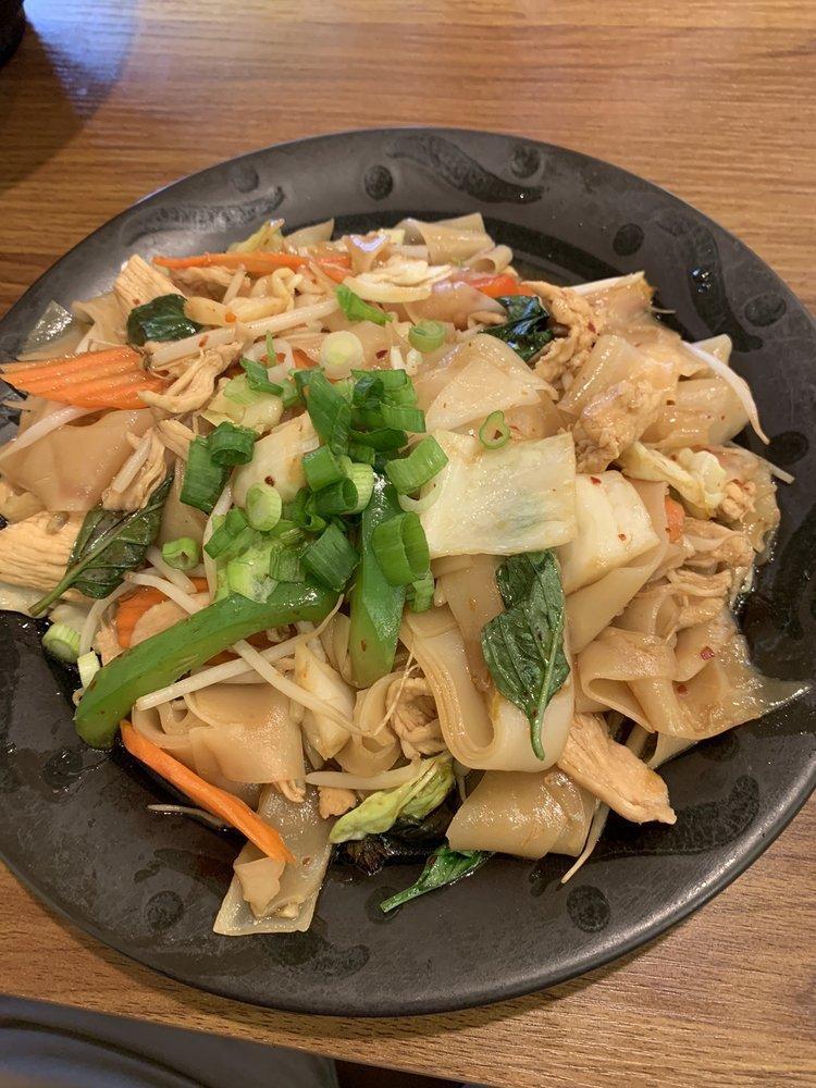 Drunken Noodles · Stir fried wide rice noodles, carrot, cabbage, bell peppers, bean sprout and basil.