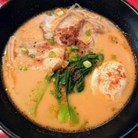 Tonkotsu Ramen · Chioce of chashu pork or crispy panko chicken, egg, bok choy, pickled bamboo, fish cake, gre...