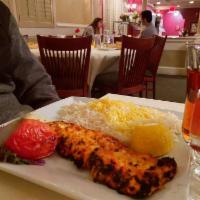Chicken Kabob · A skewer of boneless chicken breast chunks marinated in a saffron sauce and charbroiled.