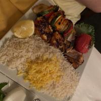 Salmon Fish Kabob · Charbroiled salmon fillet, seasoned with lemon saffron sauce and flavored with butter.