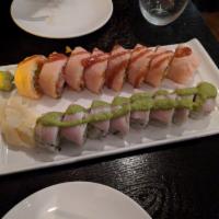 American Standard Roll · Tuna, salmon, yellowtail, avocado, negi, kani and masago roll wrapped in soy paper with miso...