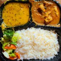 Chicken Curry · Chicken cooked with mild north Indian curry sauce.

