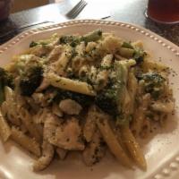 Ziti with Chicken and Broccoli · Made with freshly marinated chicken breast, broccoli and homemade creamy Alfredo sauce.