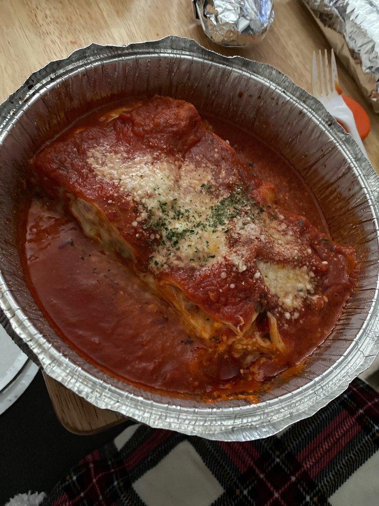Lasagna · Homemade from scratch with 100% Beef, eggs,riccota cheese,mozzarella cheese,marinara sauce and Italian herbs.