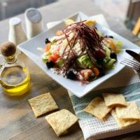 Greek Salad · Tomato, cucumber, bell pepper, onion, feta cheese, dry beef, olives  and lettuce. Dressing o...