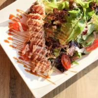 Grilled Tuna Salad · Green leaves, raw tuna, cherry tomatoes, red onion, avocado  and cucumbers.