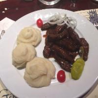 Skirt Steak on the Grill · Marinated Skirt Steak with Teriyaki Sauce. Served with mashed potato, rice, or buckwheat. (8...