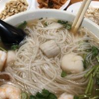 Seafood Pho Noodle Soup · Comes with shrimp, scallop, rice noodles, cilantro, basil, green onion, jalapeño, lime, bean...