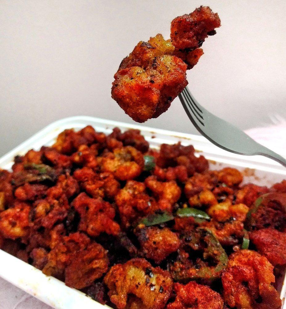 Volcano Chicken · Lightly coated chicken sauteed with a secret blend of spices. Hot and spicy.