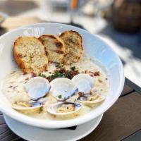 Clam Chowder · Clams, bacon, potatoes, celery, onions and chives.