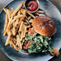 Fresno Fig Burger · Fig marmalade, melted goat cheese, bacon, tomatoes, red onions, arugula, and spicy porter mu...