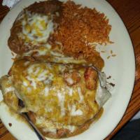 Supreme Burrito · Ground beef, rice, beans, onions, and cheese smothered with our pork green chili sauce and s...