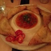Crab Rangoon · Dungeness crab, sweet and sour, and pickled chilies.