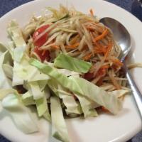 Som Tum · Our signature green papaya salad with either: green beans, tomato, and lime sauce thai style...