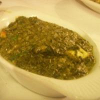Palak Paneer · Chunks of homemade cheese cooked with fresh spinach, herbs and spices. Veggie.SEVERE WITH RI...