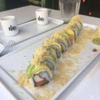 Spicy Crunch Roll · Spicy salmon and crab topped with avocado and tempura flakes.