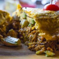 Patacon · Green plantains. Stuffed with shredded beef, shredded chicken pulled pork OR shrimp served w...
