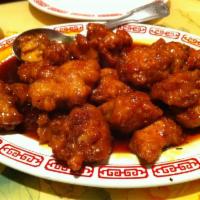 Orange Chicken · Spicy. Deliciously breaded chicken, sauteed in our chef's special sauce with a touch of oran...