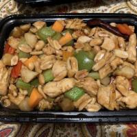Kung Pao Chicken · Diced chicken, bell peppers, celery and water chestnuts, sauteed with dried hot chili pepper...
