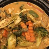 Thai Red Curry · Chicken, bamboo shoot, bell pepper, Thai basil and coconut milk.