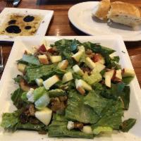 Apple Walnut Salad · Gala apples, Gorgonazola, golden raisins, candied walnuts, crispy bacon & mixed greens with ...