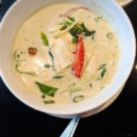 Green Curry · Bamboo shoot, eggplant, basil and bell pepper in spicy coconut milk. Spicy. 