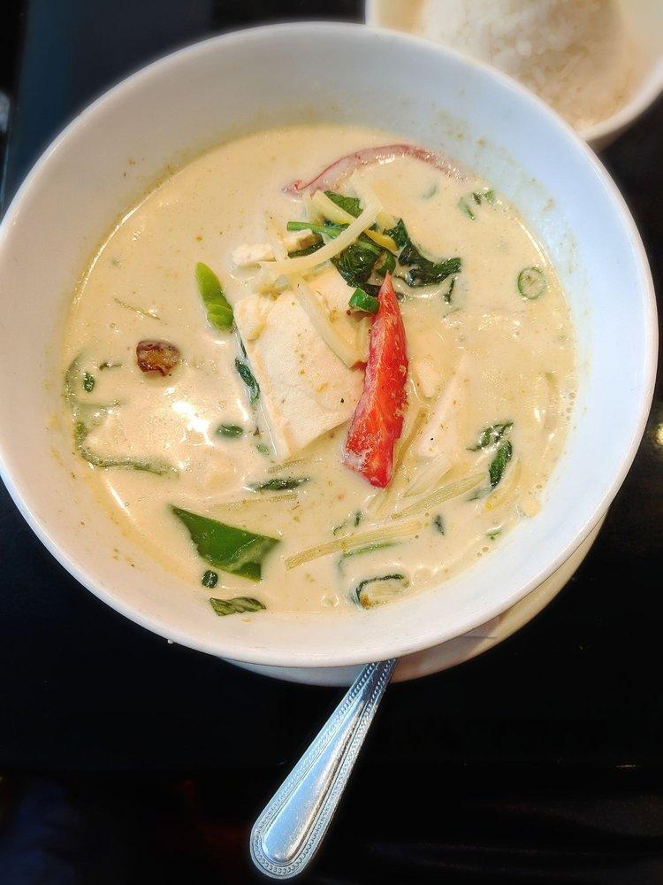 Green Curry · Bamboo shoot, eggplant, basil and bell pepper in spicy coconut milk. Spicy. 