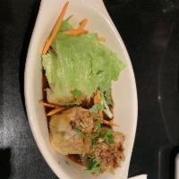 Thai 51 Dumpling · Chicken and shrimp with black bean vinaigrette. 