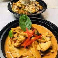 Red Curry · Red curry and coconut milk with bamboo shoots, bell peppers, basil leaves and sweet peas. Se...