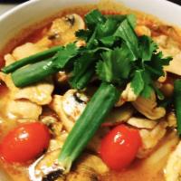 Chicken Tom Yum Soup · Spicy Thai clear soup with lemongrass, mushrooms, red onions, scallions, tomatoes, chicken a...