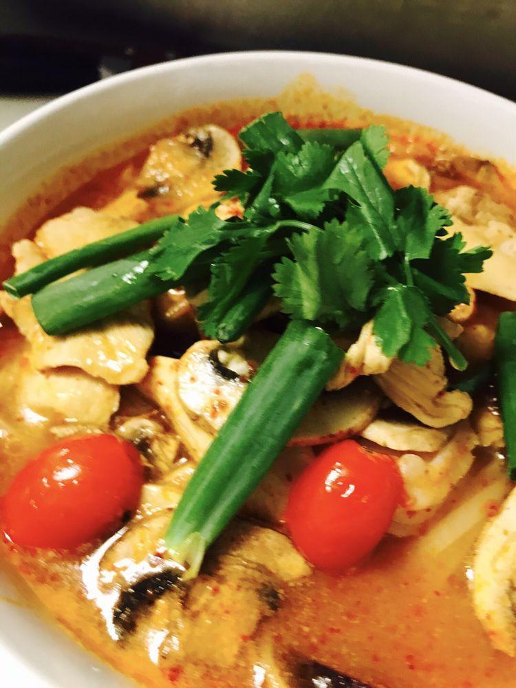 Chicken Tom Yum Soup · Spicy Thai clear soup with lemongrass, mushrooms, red onions, scallions, tomatoes, chicken and rice noodles. Spicy. 