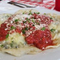 Sauteed Spinach Ravioli · Spinach and light ricotta filled and served with marinara sauce.