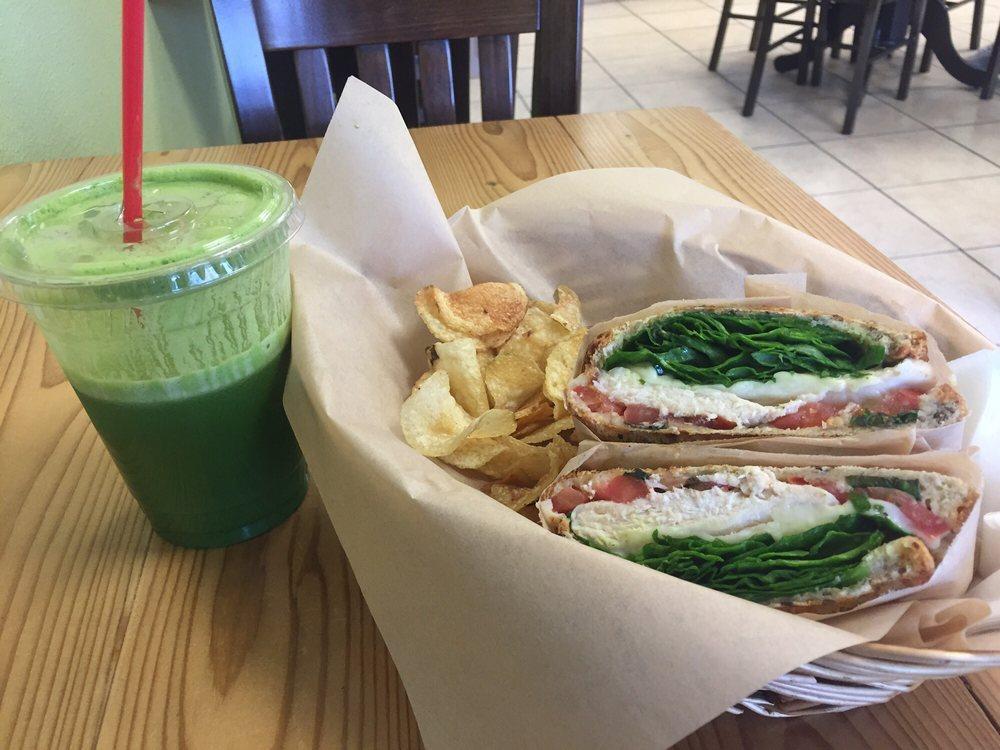 Chicken Pesto Sandwich · Organic chicken breast, spinach, fresh basil, tomato, mozzarella cheese with pesto sauce on flatbread. Served with chips and carrot sticks.