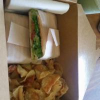 Avocado BLT Sandwich · Avocado, turkey bacon, green leaf lettuce, tomato and low fat mayo on flatbread. Served with...