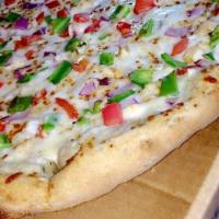 Chicken Ranch Pizza · Tomatoes, green peppers, onions, chicken and ranch.