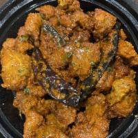 Chicken 65 · Chef's special fried chicken sautéed with green chilies and spicy red sauce with yogurt.