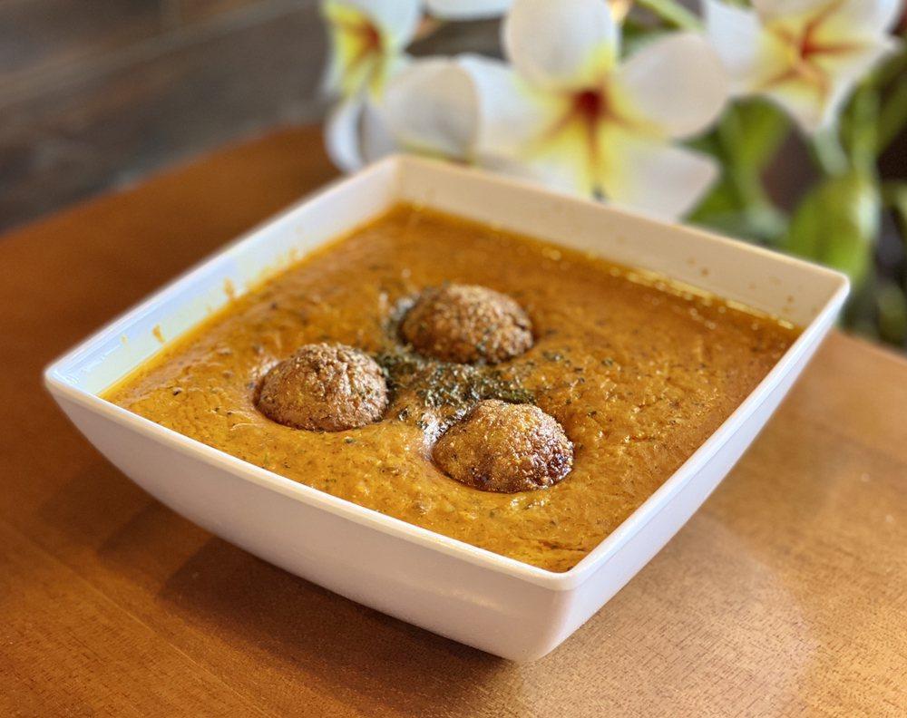 Malai Kofta · Chef special. Potato dumplings made with veggies, cheese, and cashew nuts cooked in delicious creamy gravy.