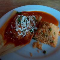 Tamales · 2 handmade tamales, a savory dough of grained corn in a corn husk filled with your choice of...