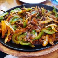 Fajitas · Your choice of chicken, steak, shrimp, or veggies.  with roasted bell peppers and onions. Se...