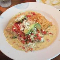 La Costa Enchiladas · Drenched in a creamy white wine sauce, 2 corn tortillas filled with your choice of fish or s...