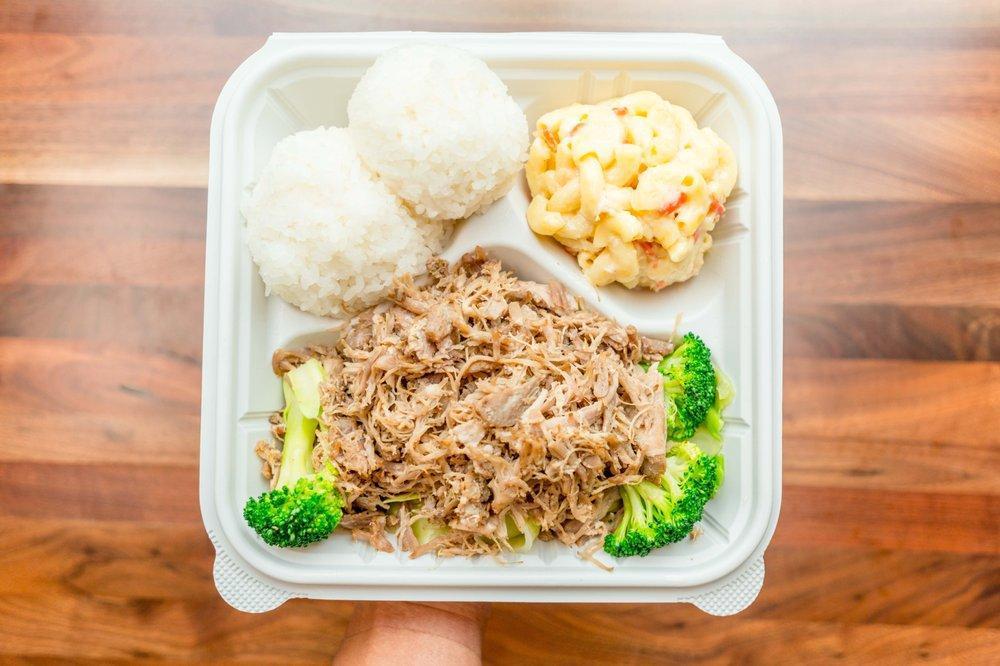 Kalua Pork with Cabbage · Slow roasted pork with a hint of smoky flavor, served shredded over steamed cabbage. Hawaii’s version of the pulled pork.