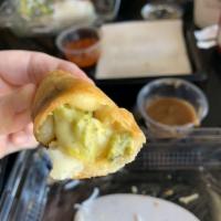 Fried New Mexico Egg Roll · Mac and cheese, broccoli and green chili.