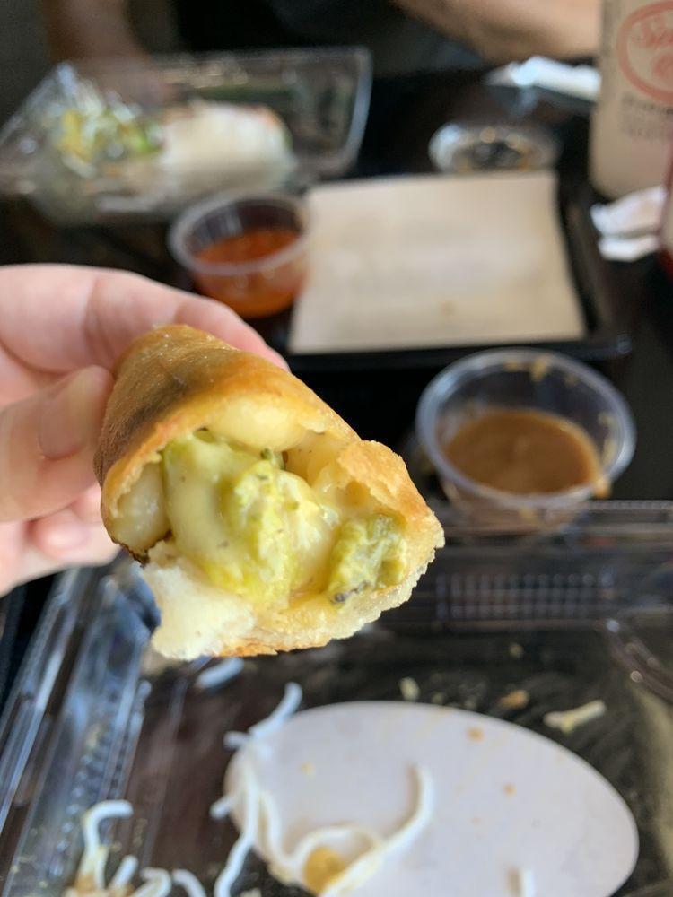 Fried New Mexico Egg Roll · Mac and cheese, broccoli and green chili.